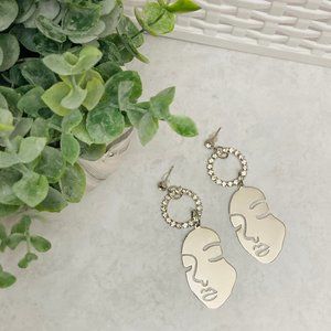 Silver Picasso face & rhinestone drop earrings